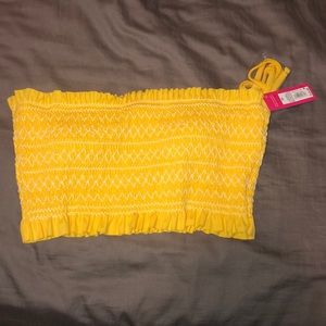 Bandeau swimsuit top—straps included.